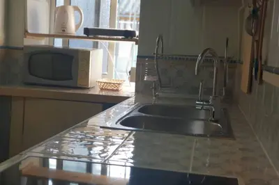 Una cocina o zona de cocina en Bonito y coqueto apartamento