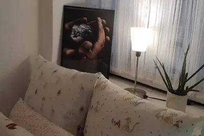 Zona de estar de Bonito y coqueto apartamento