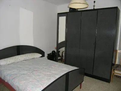 Cama o camas de una habitación en Piso en Sevilla Este