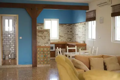 Zona de estar de Preciosa y confortable casa de campo con piscina y chimenea