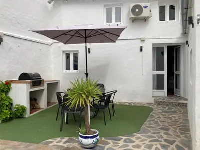 Un patio o zona al aire libre en Traditional Village House with Private Pool in Villanueva de San Juan