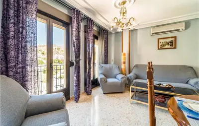 Zona de estar de 3 Bedroom Cozy Apartment In Pegalajar