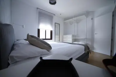 Cama o camas de una habitación en Apartamento en San Basilio junto a Torre de Belen