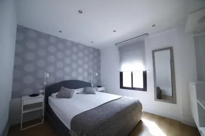 Cama o camas de una habitación en Apartamento en San Basilio junto a Torre de Belen