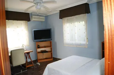 Una televisión o centro de entretenimiento en Villa Coco
