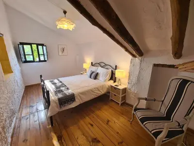 Cama o camas de una habitación en Cortijo Las Rodrigas