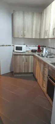 Una cocina o zona de cocina en Sevilla Nervion Santa Justa