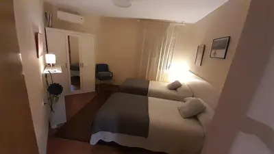 Cama o camas de una habitación en Sevilla Nervion Santa Justa