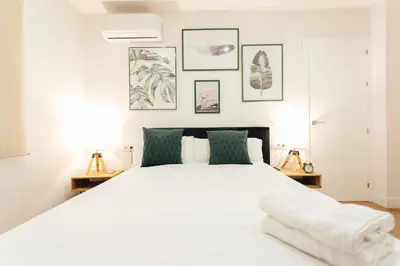 Cama o camas de una habitación en Alohamundi Puerta Osario