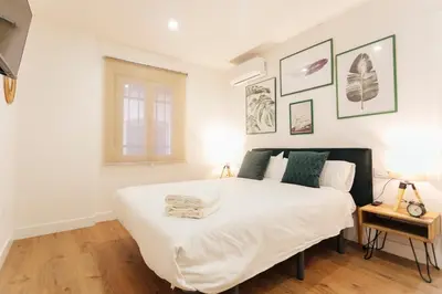 Cama o camas de una habitación en Alohamundi Puerta Osario