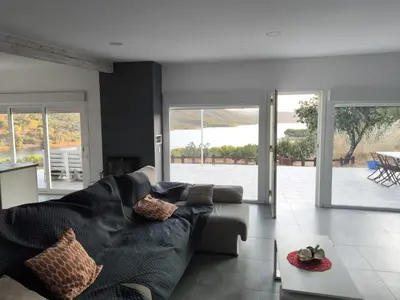 Zona de estar de Casa en el lago.unmillondeestrellas