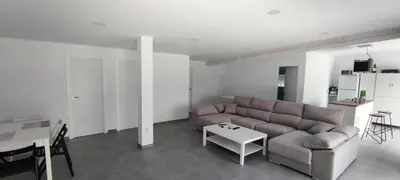 Zona de estar de Casa en el lago.unmillondeestrellas