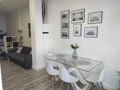 Zona de estar de APARTAMENTO TURISTICO LYRA BAENA