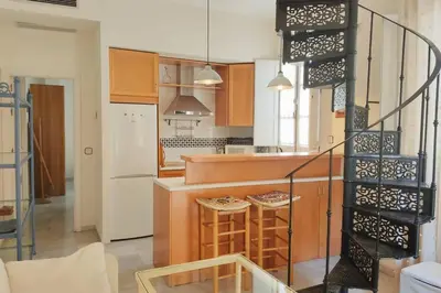 Una cocina o zona de cocina en HomeySeville-Duplex con Terraza Santa Cruz 5 pax, Parking Optional