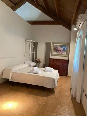 Cama o camas de una habitación en EL ENREO JARAS -Urbanización Las Jaras Córdoba