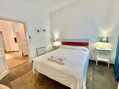 Cama o camas de una habitación en Acogedor apt 8pax 4Bdr 2Bth - CozyHomeSevilla1