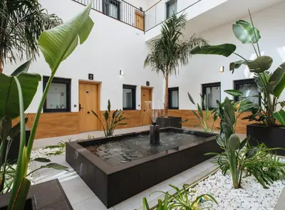 Jardín al aire libre en Guadalupe 15 by Magno Apartments