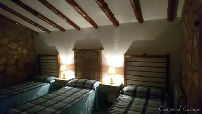Cama o camas de una habitación en Casas Rurales Cortijos el Encinar