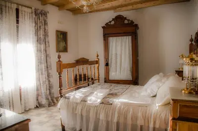 Cama o camas de una habitación en Casa Rural La CasAna