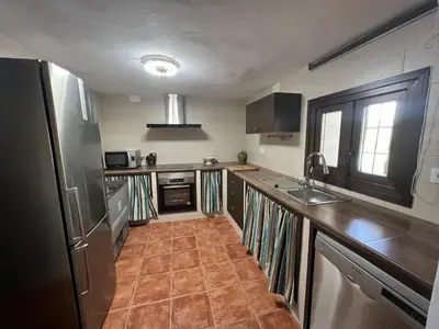 Una cocina o zona de cocina en Alojamiento Rural Cortijo Alameda, Las Lagunillas