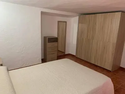 Cama o camas de una habitación en Alojamiento Rural Cortijo Alameda, Las Lagunillas