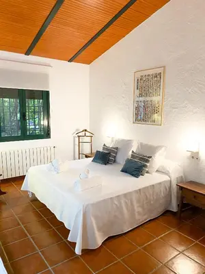 Cama o camas de una habitación en La Buganvilla