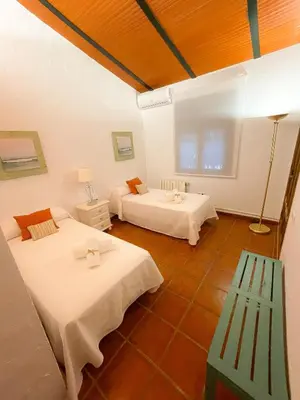 Cama o camas de una habitación en La Buganvilla