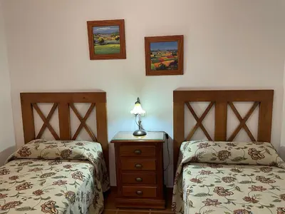 Cama o camas de una habitación en Casa Manolín