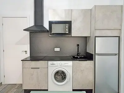 Una cocina o zona de cocina en Modernos Apartamentos en Ciudad Jardín Córdoba