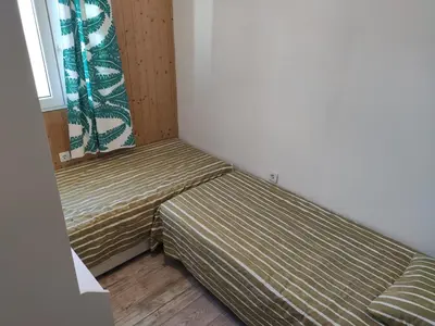 Cama o camas de una habitación en Luminoso y acogedor apartamento junto a la Macarena de Sevilla