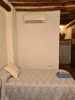 Cama o camas de una habitación en La Posada Amena