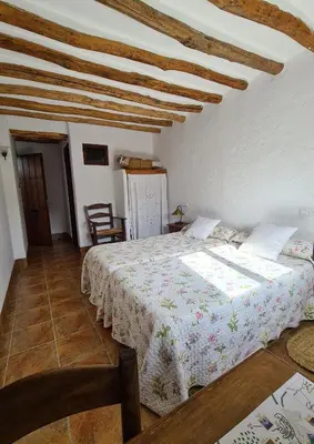 Cama o camas de una habitación en La Posada Amena
