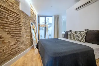 Cama o camas de una habitación en Victoria Suites Apartments