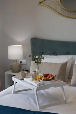 Cama o camas de una habitación en Apartamentos Ribera 19