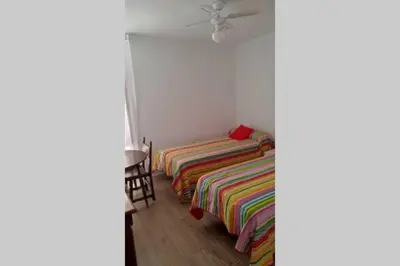 Cama o camas de una habitación en MUY CÉNTRICO, A 8 MIN DEL AVE ANDANDO, REFORMADO.