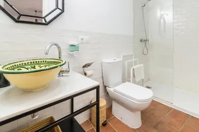 Un baño de La Jⲟya de los Patios - Apartamentos Turísticos