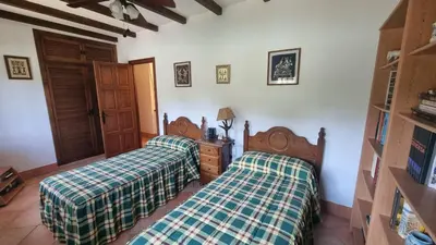 Cama o camas de una habitación en Aljubea, tu casa rural en Cordoba