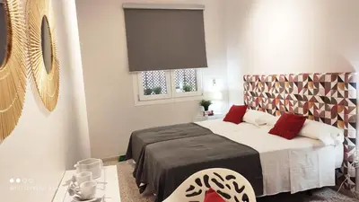 Cama o camas de una habitación en Sweet Home Alameda 2