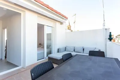 Cama o camas de una habitación en Duplex Penthouse with Terrace by TheGoodTourist