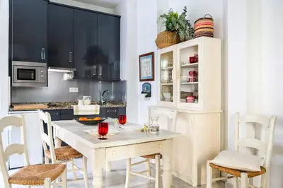 Una cocina o zona de cocina en Misterhost Santa Cruz Judería - Acogedor y tranquilo - Casco Histórico