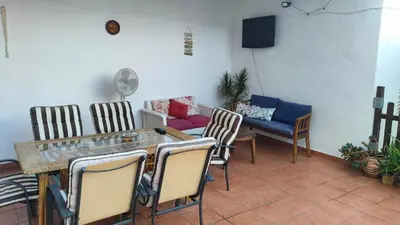Zona de estar de Le new village