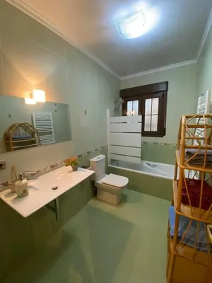 Un baño de Le new village