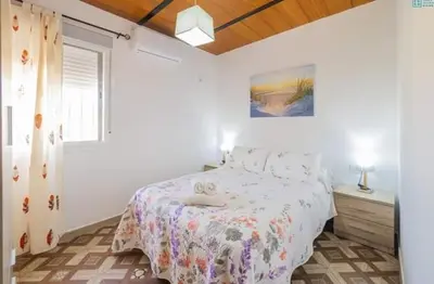 Cama o camas de una habitación en EL CHASCÁ