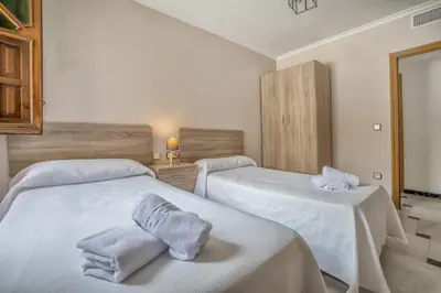 Cama o camas de una habitación en Casa con patio María Auxiliadora
