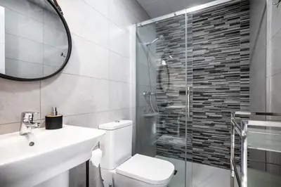 Un baño de Luxurys Costasol33 Aptos 1 y 2