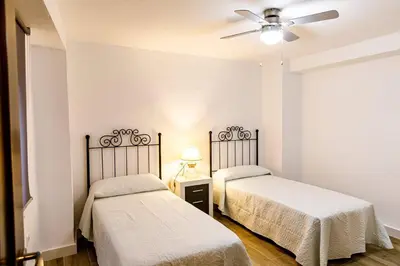 Cama o camas de una habitación en Alojamiento Rural Casa Triana