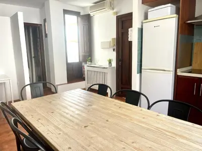Una cocina o zona de cocina en RIBERA SUITE CÓRDOBA