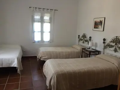 Cama o camas de una habitación en Hacienda Torrepalma apartamentos