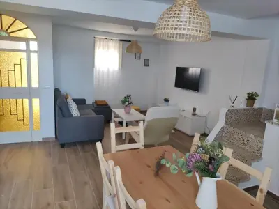 Una televisión o centro de entretenimiento en La casa de mi Rosa