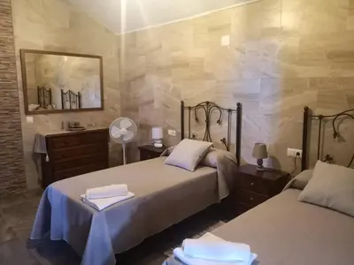 Cama o camas de una habitación en Casa rural La Pradera